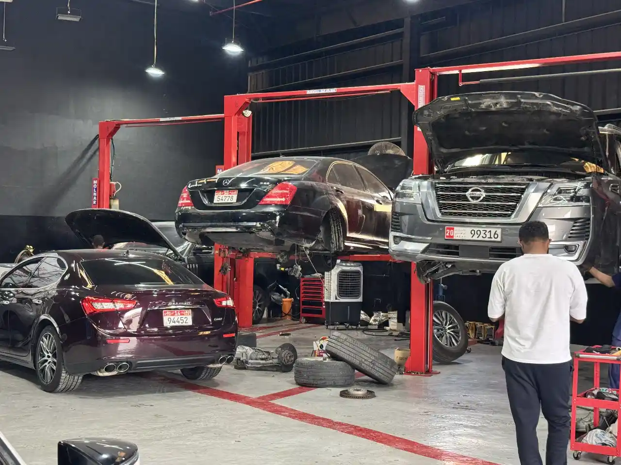 Zenfo Auto Services technicians performing complete major and minor car services